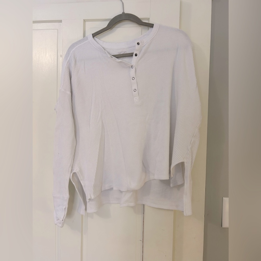 Aerie flows off the shoulder white top